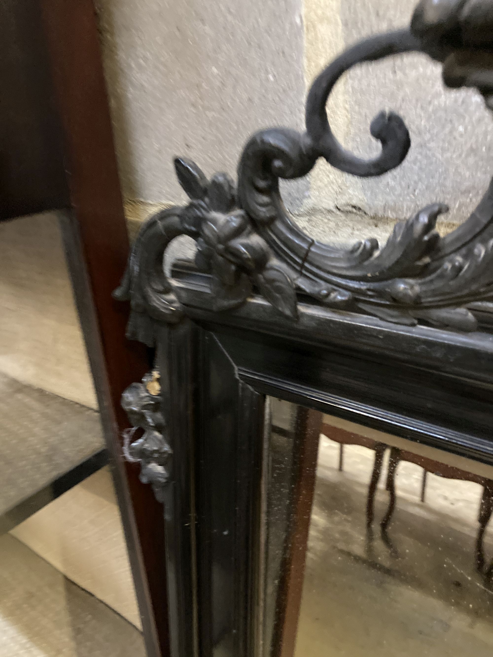 A 19th century French ebonised wall mirror, width 86cm, height 158cm